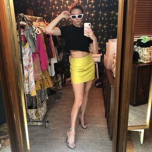 Like New Coach leather yellow mini skirt